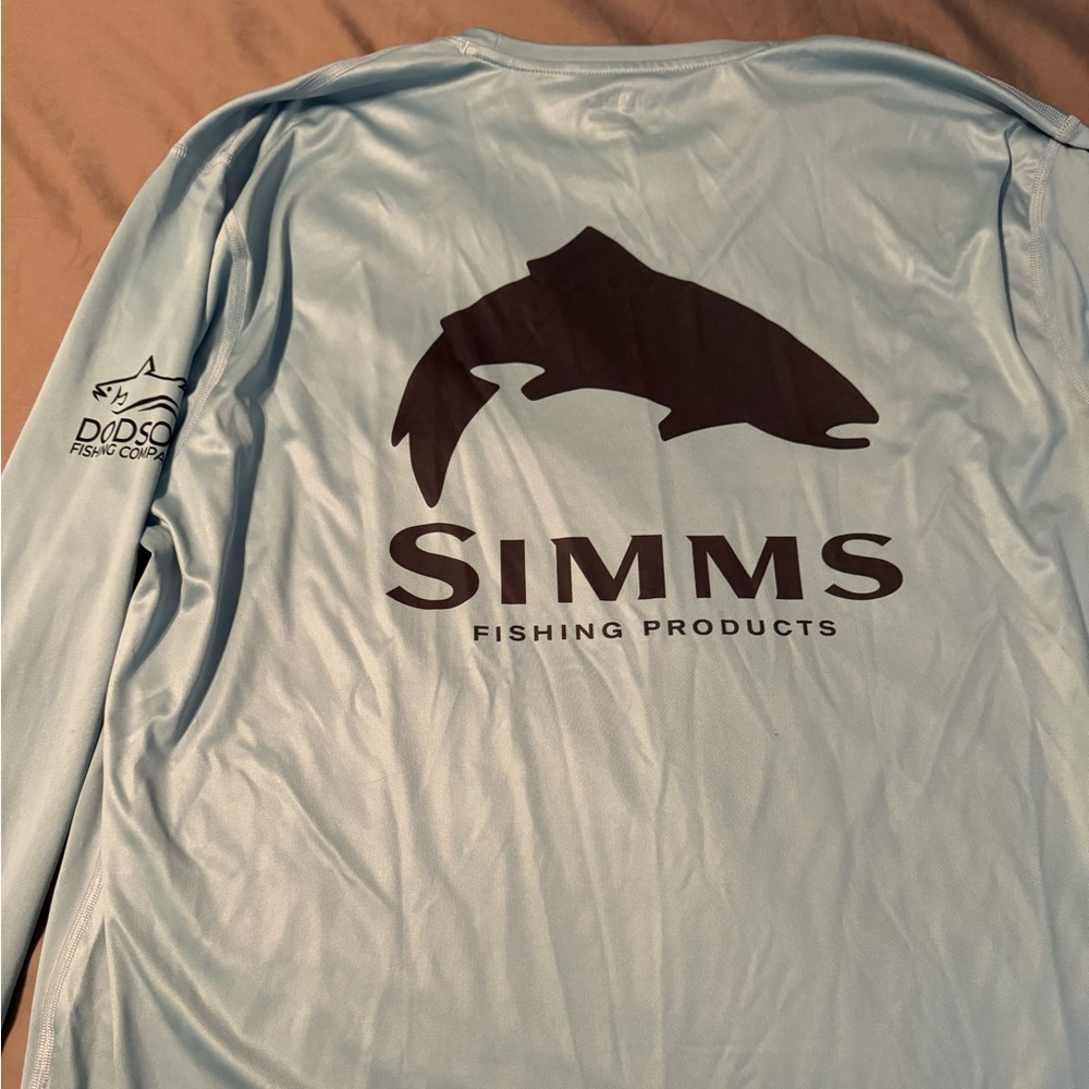 Simms Fishing shirt with Dodson Fishing Company logo